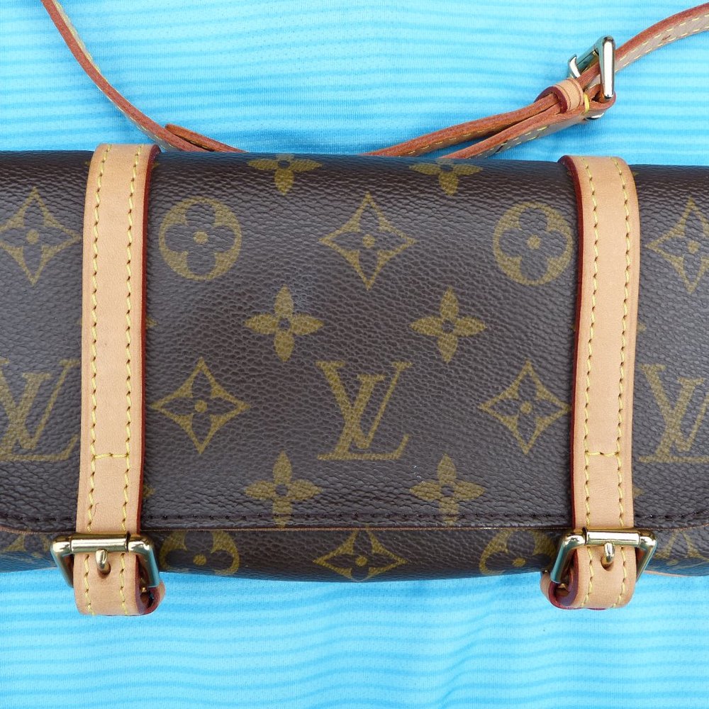 Louis Vuitton Fanny Pack/Clutch M10025